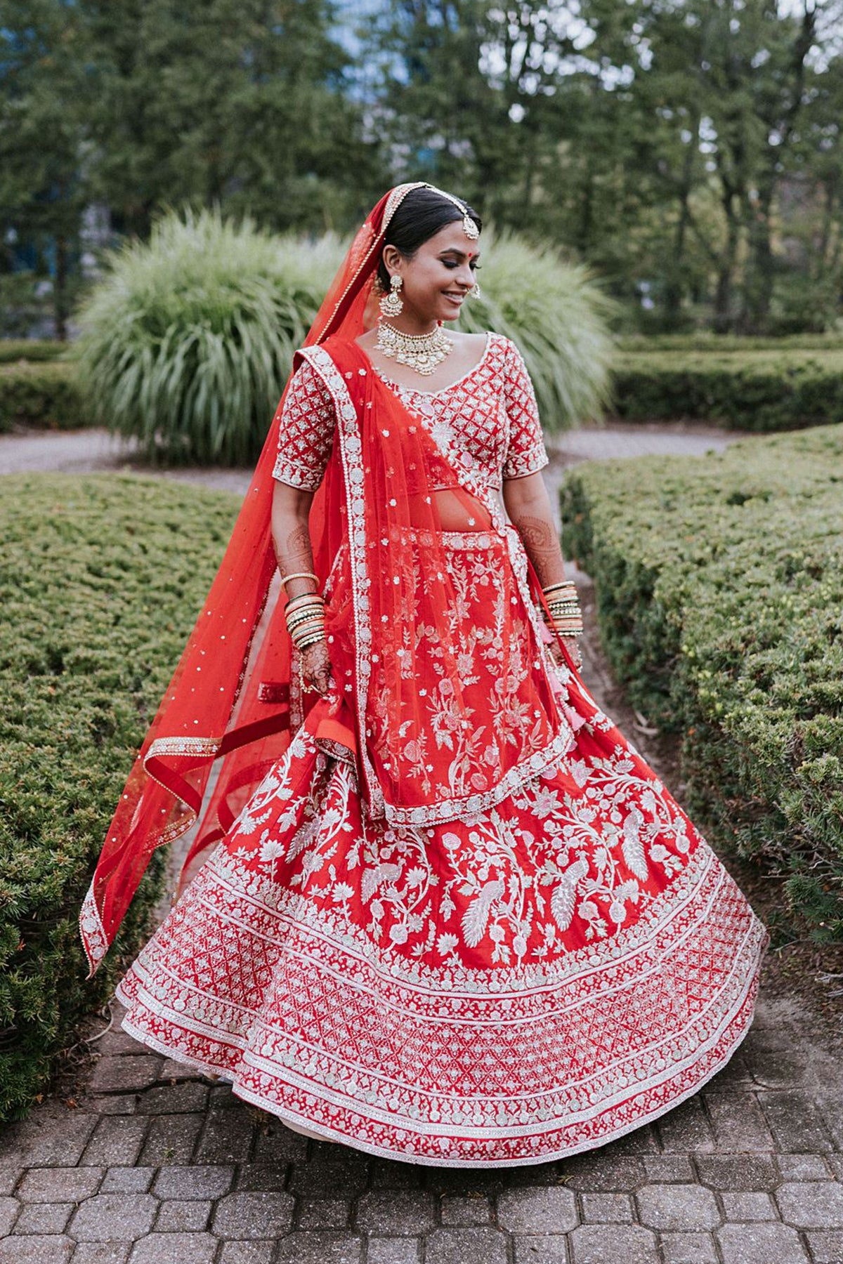Chamee and Palak red lehenga bride